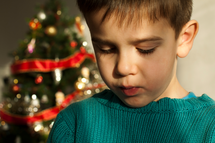 child sad christmas