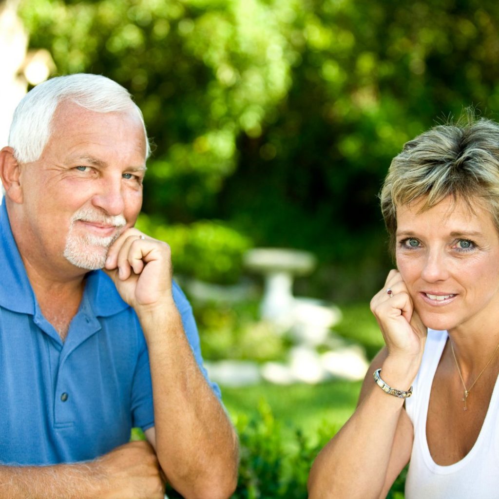 Man and woman sitting across from one another.